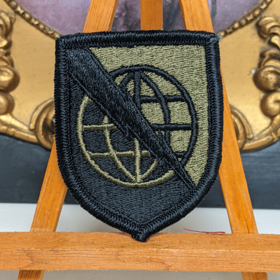 25th Military Police Brigade - Hawaii Combat Service ID Badge Subdued US Army Sew-on Patch 3 x 2 in. USED